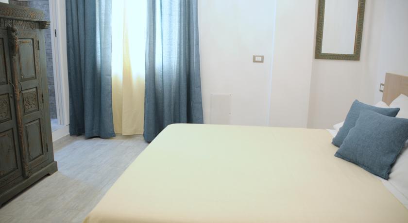 Piazza Martiri Rooms Кальярі Номер фото